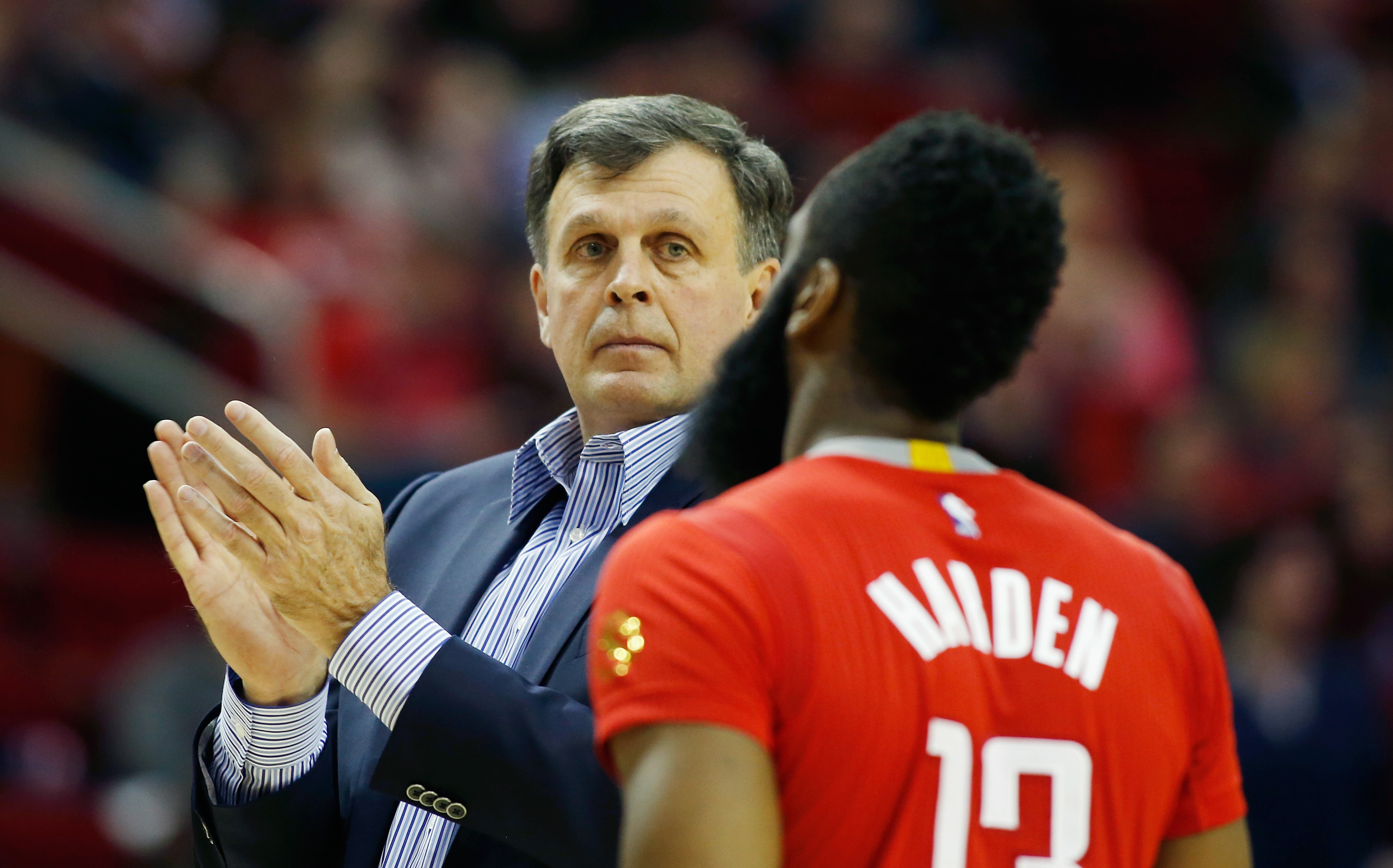 James Harden of the Houston Rockets is greeted by his head coach Kevin McHale.
