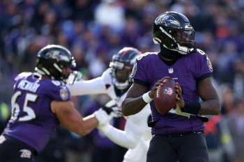 Lamar Jackson prepares to throw a pass for the Baltimore Ravens.