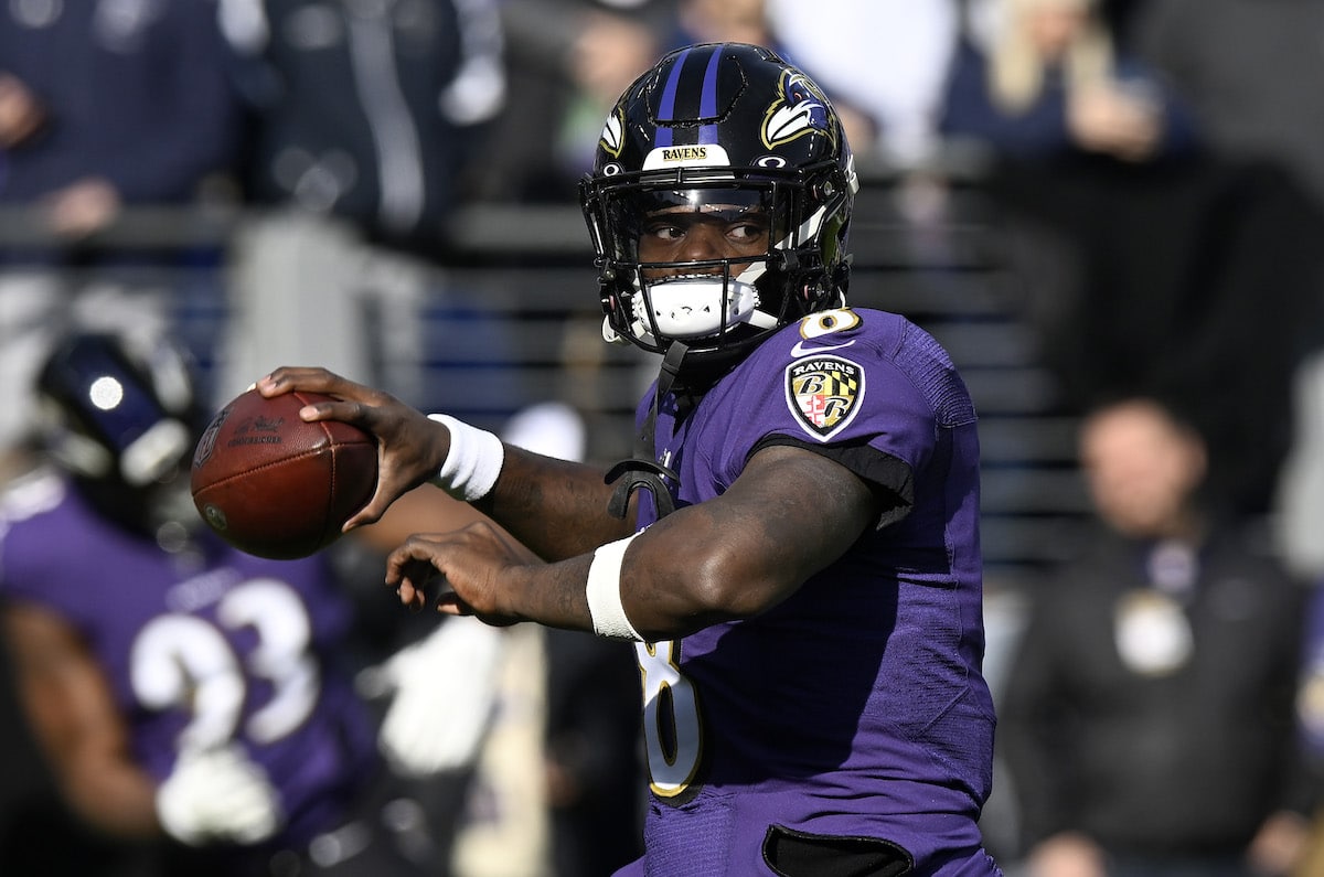 Lamar Jackson throws the ball for the Baltimore Ravens.