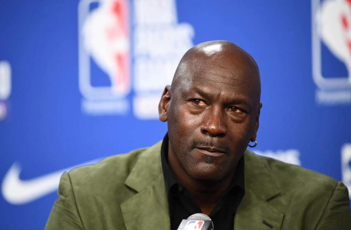 Retired NBA star Michael Jordan looks on during an NBA press conference