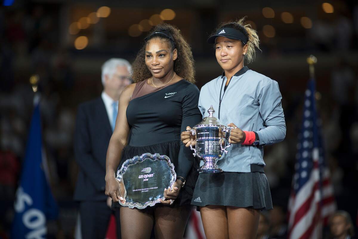 2018 U.S. Open Tennis tournament winner Naomi Osaka stands with runner-up Serena Williams