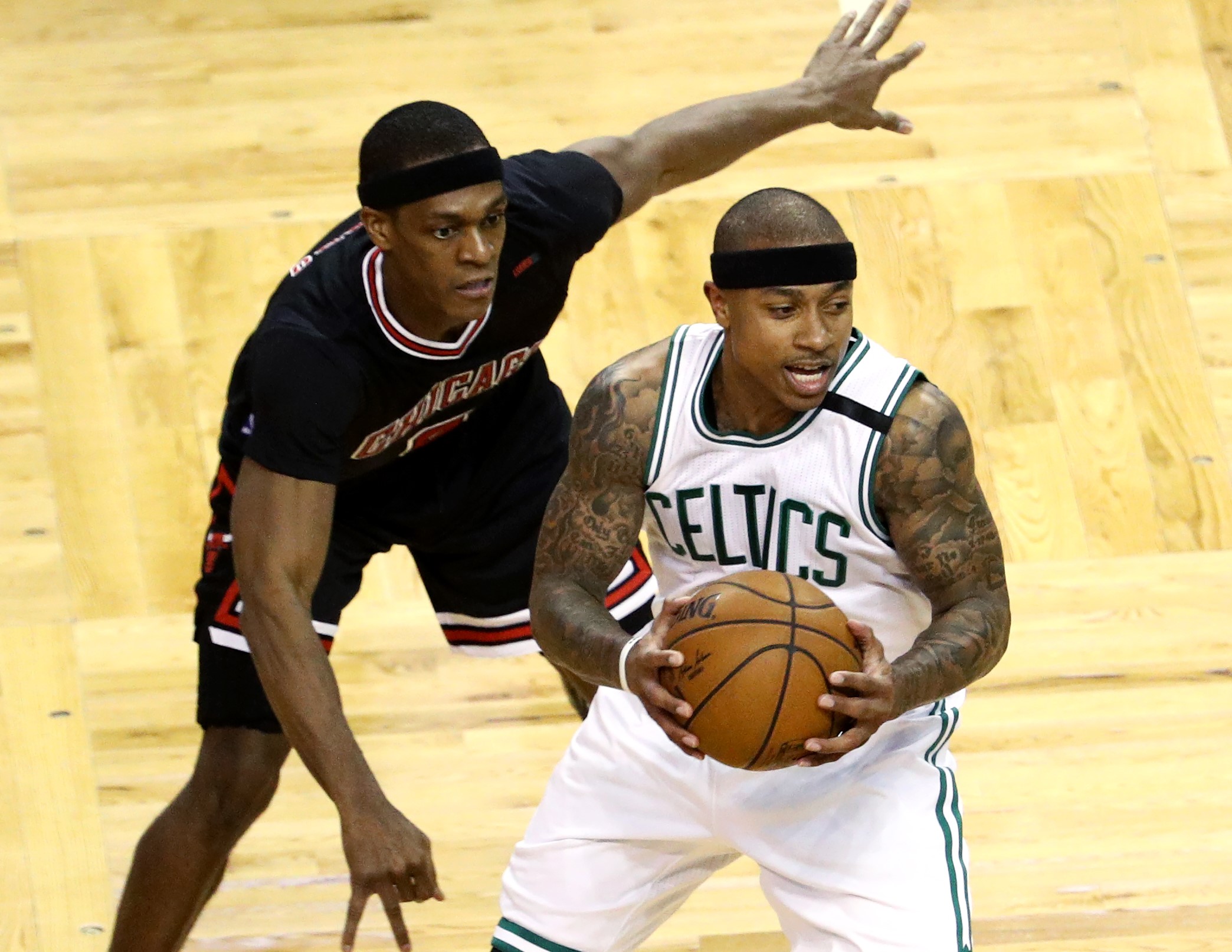 Rajon Rondo of the Chicago Bulls defends Isaiah Thomas of the Boston Celtics.
