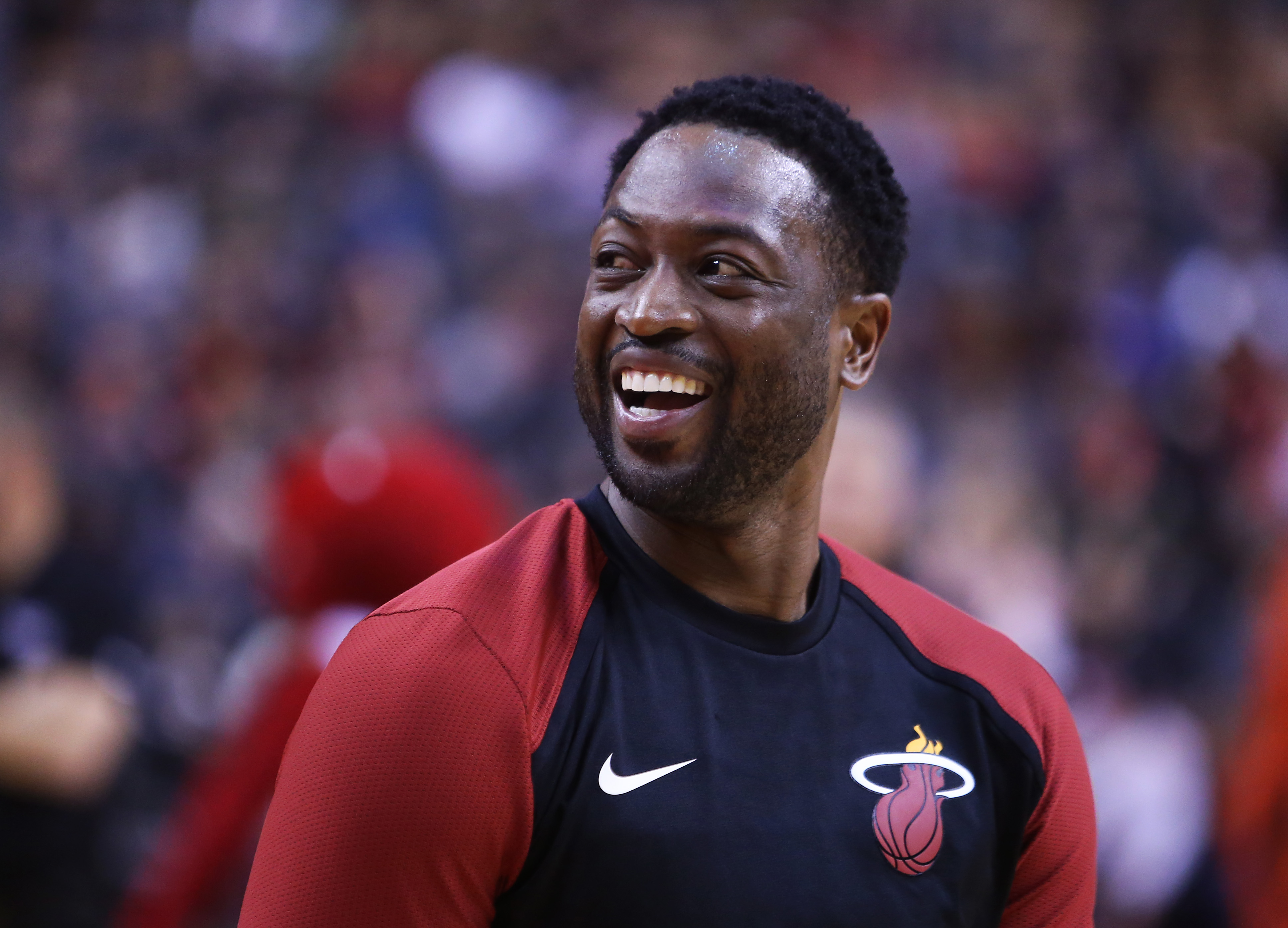 Dwyane Wade of the Miami Heat smiles during warm-ups prior to an NBA game against the Toronto Raptors.