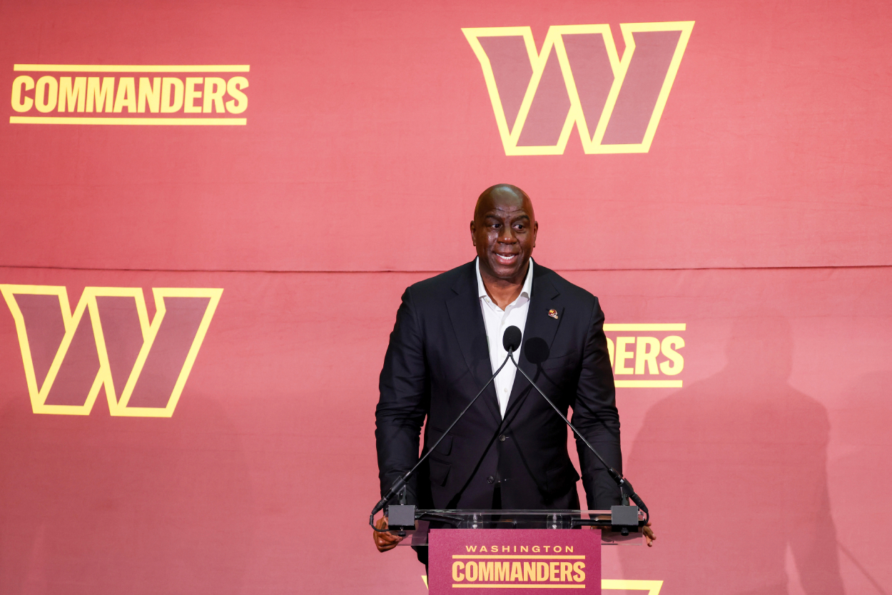 Earvin 'Magic' Johnson, a new owner of the Washington Commanders, delivers remarks during a press conference.
