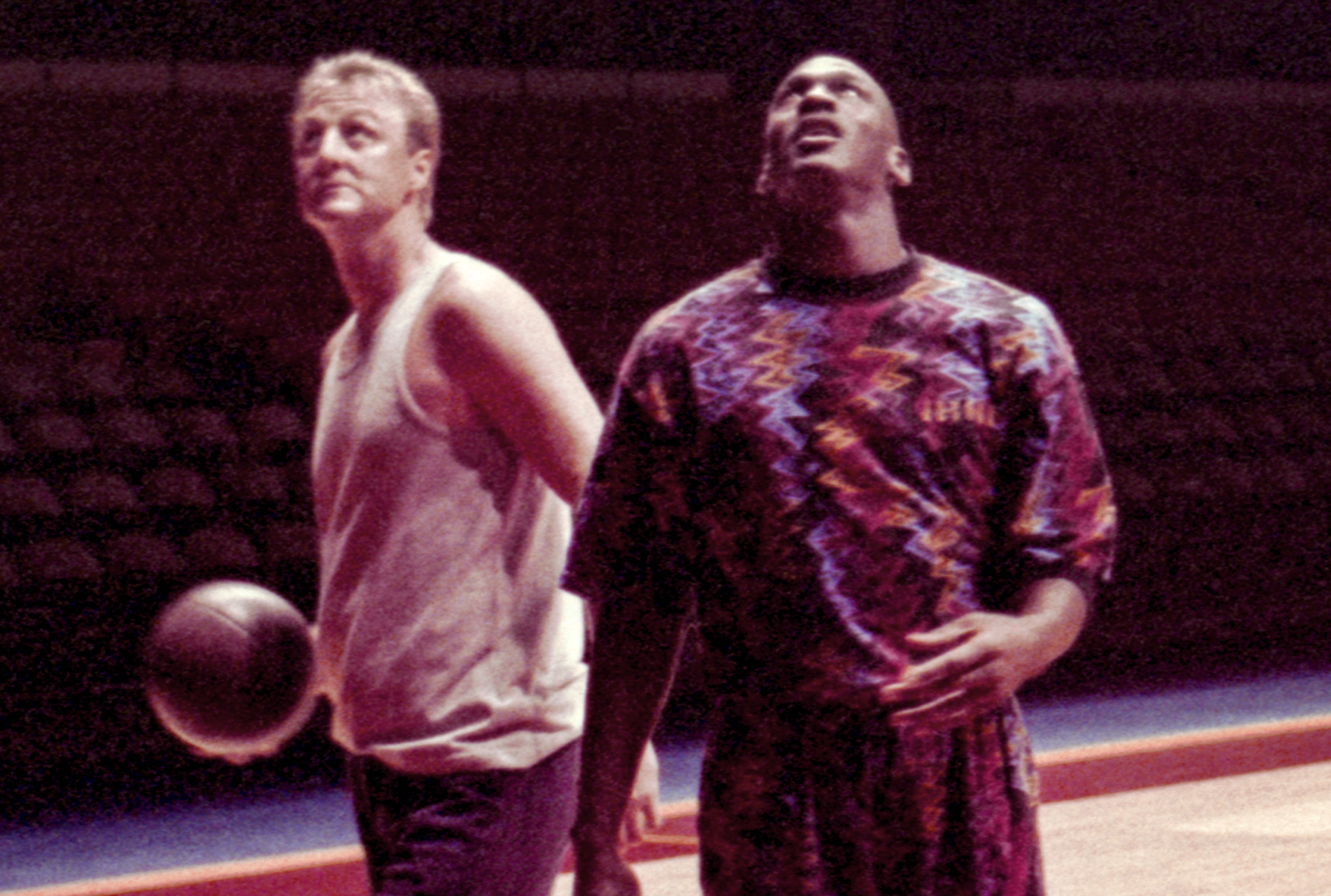Larry Bird and Michael Jordan stand by to be filmed for a McDonald's "Nothing But Net" television commercial.