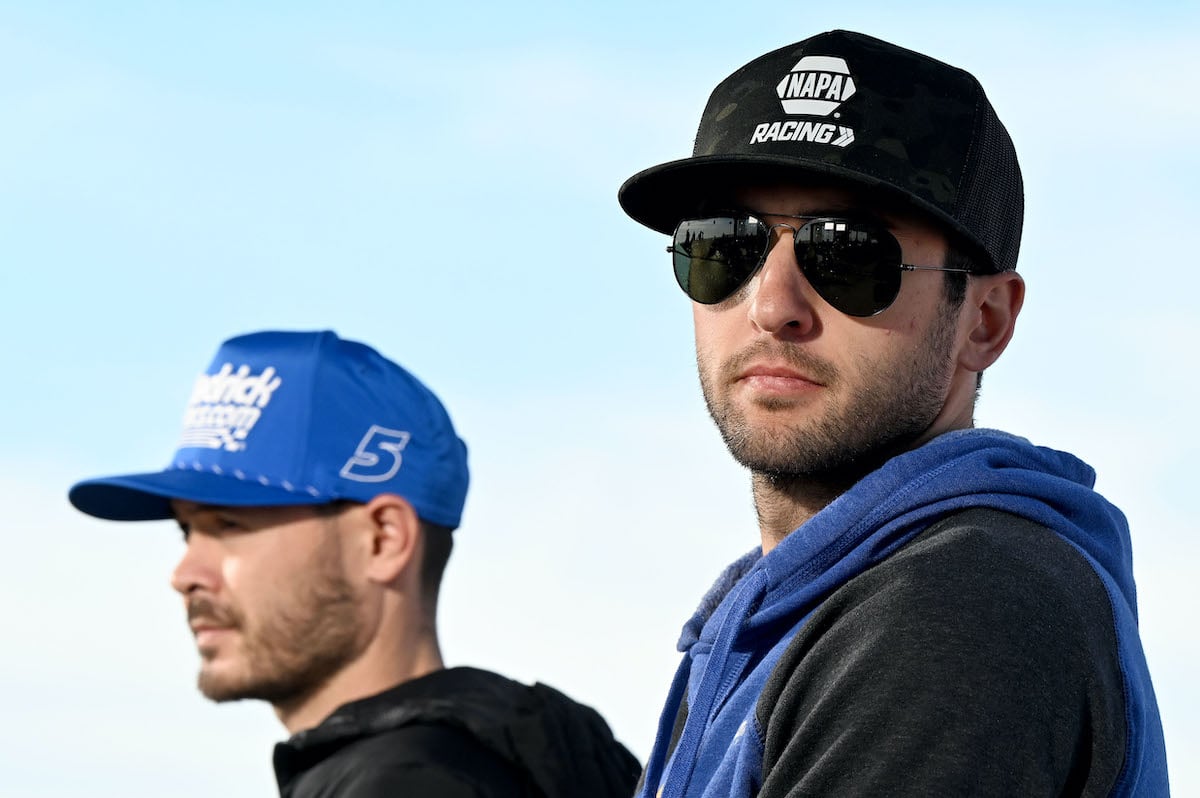 Kyle Larson and Chase Elliott sit together.