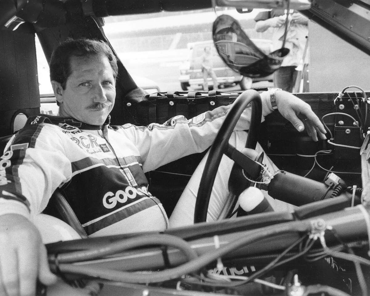 Dale Earnhardt Sr. sits in his car during practice