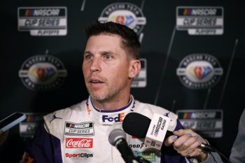 Denny Hamlin talks to media.