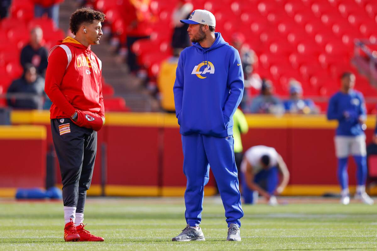 Patrick Mahomes of the Kansas City Chiefs and Matthew Stafford of the Los Angeles Rams talk during pregame warmups