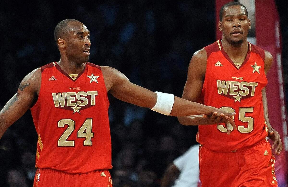 NBA stars Kobe Bryant and Kevin Durant talking during the 2011 NBA All-Star Game