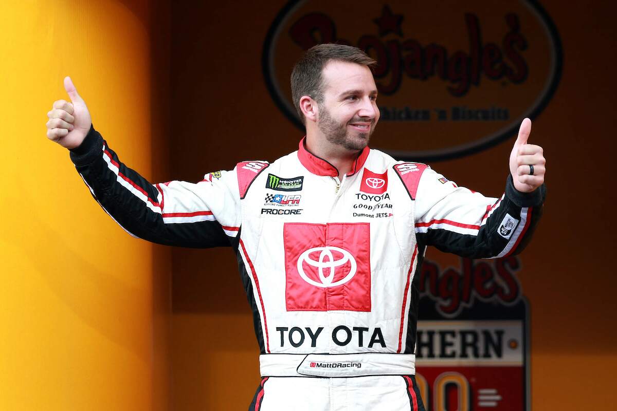 Matt DiBenedetto, driver of the #95 IMSA GTO Throwback Toyota, walks on stage during driver intros for the Monster Energy NASCAR Cup Series Bojangles' Southern 500 at Darlington Raceway on September 01, 2019