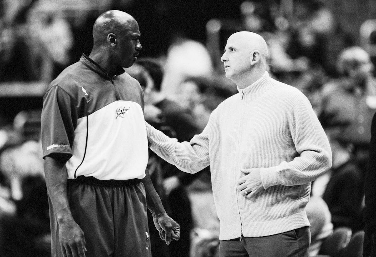 Michael Jordan of the Washington Wizards talks with his agent David Falk before a 2003 game