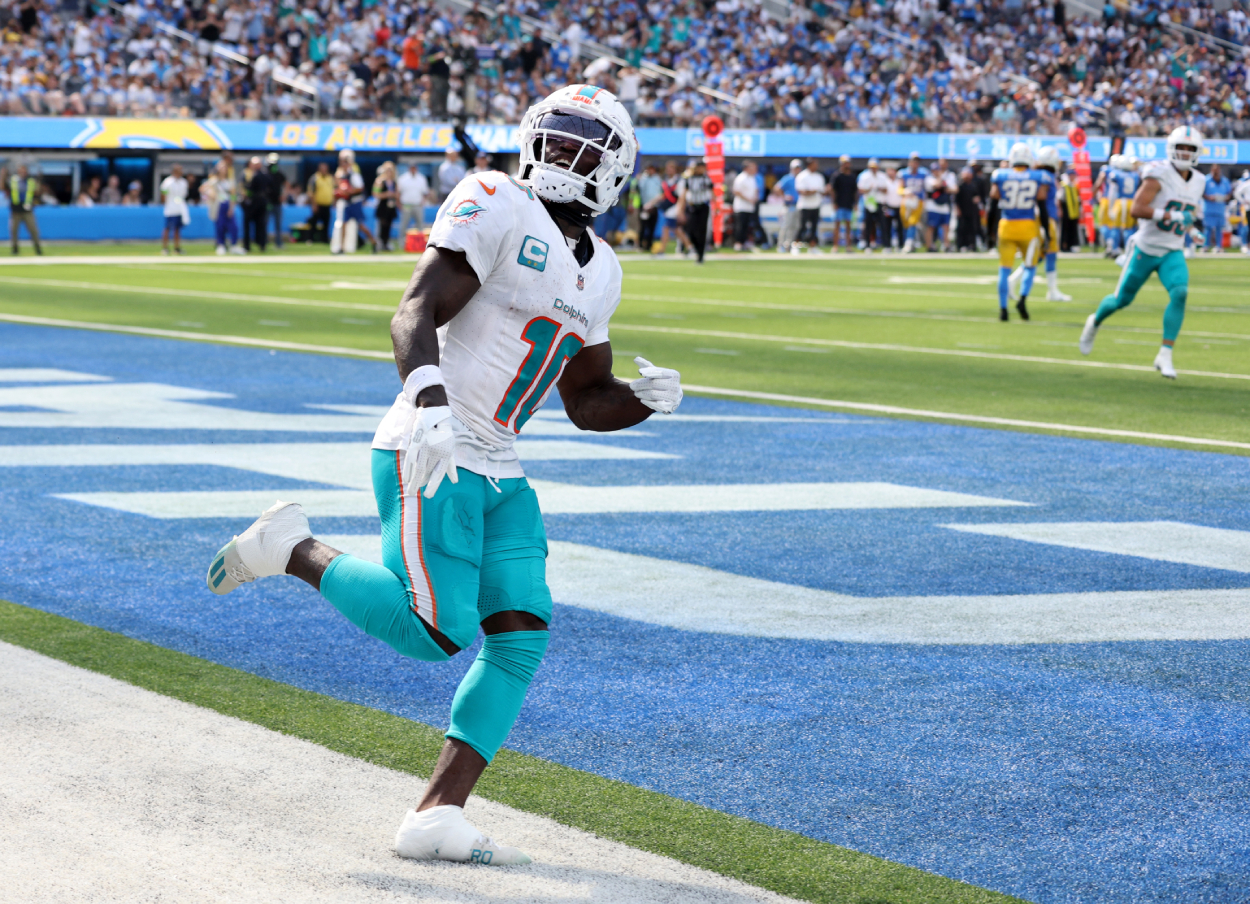 Tyreek Hill of the Miami Dolphins celebrates his touchdown.