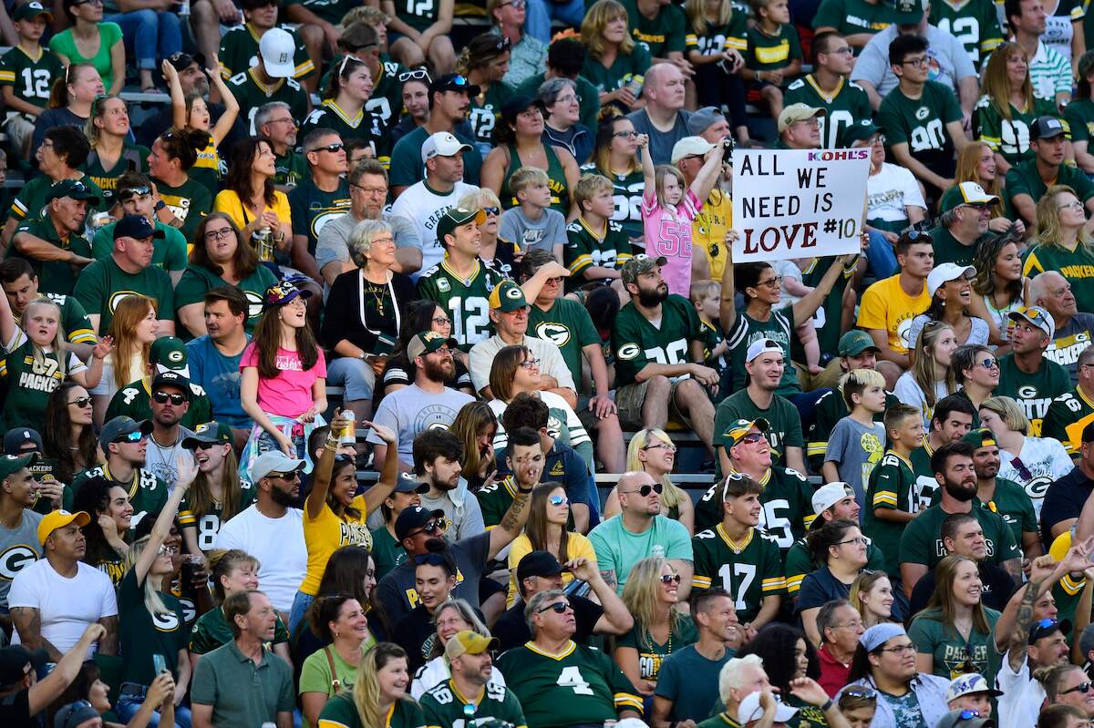 A fan holds up a sign for Jordan Love of the Green Bay Packers during a preseason 2023 game