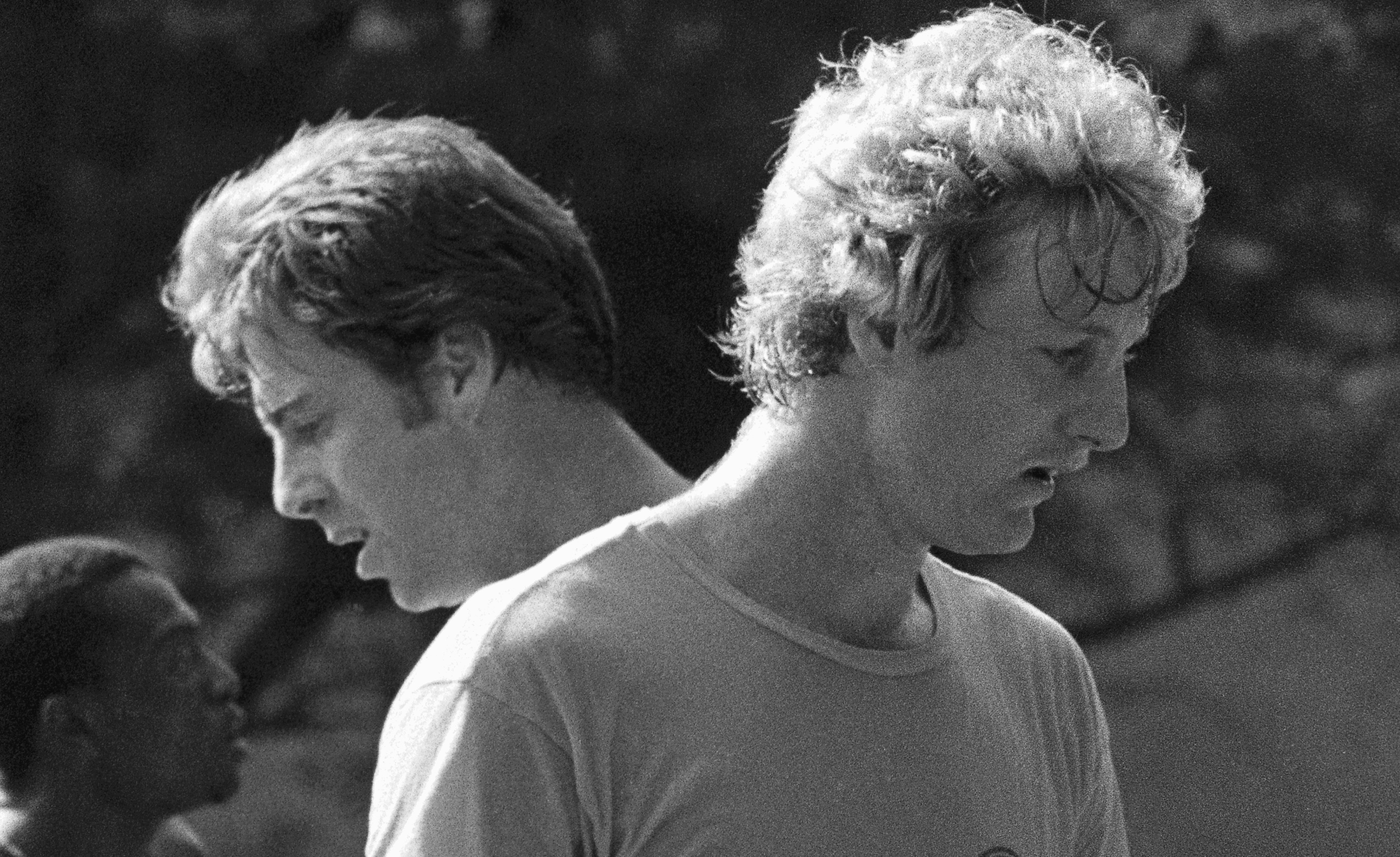 Boston Celtics star rookie Larry Bird and the club's veteran center Dave Cowens go over some plays.