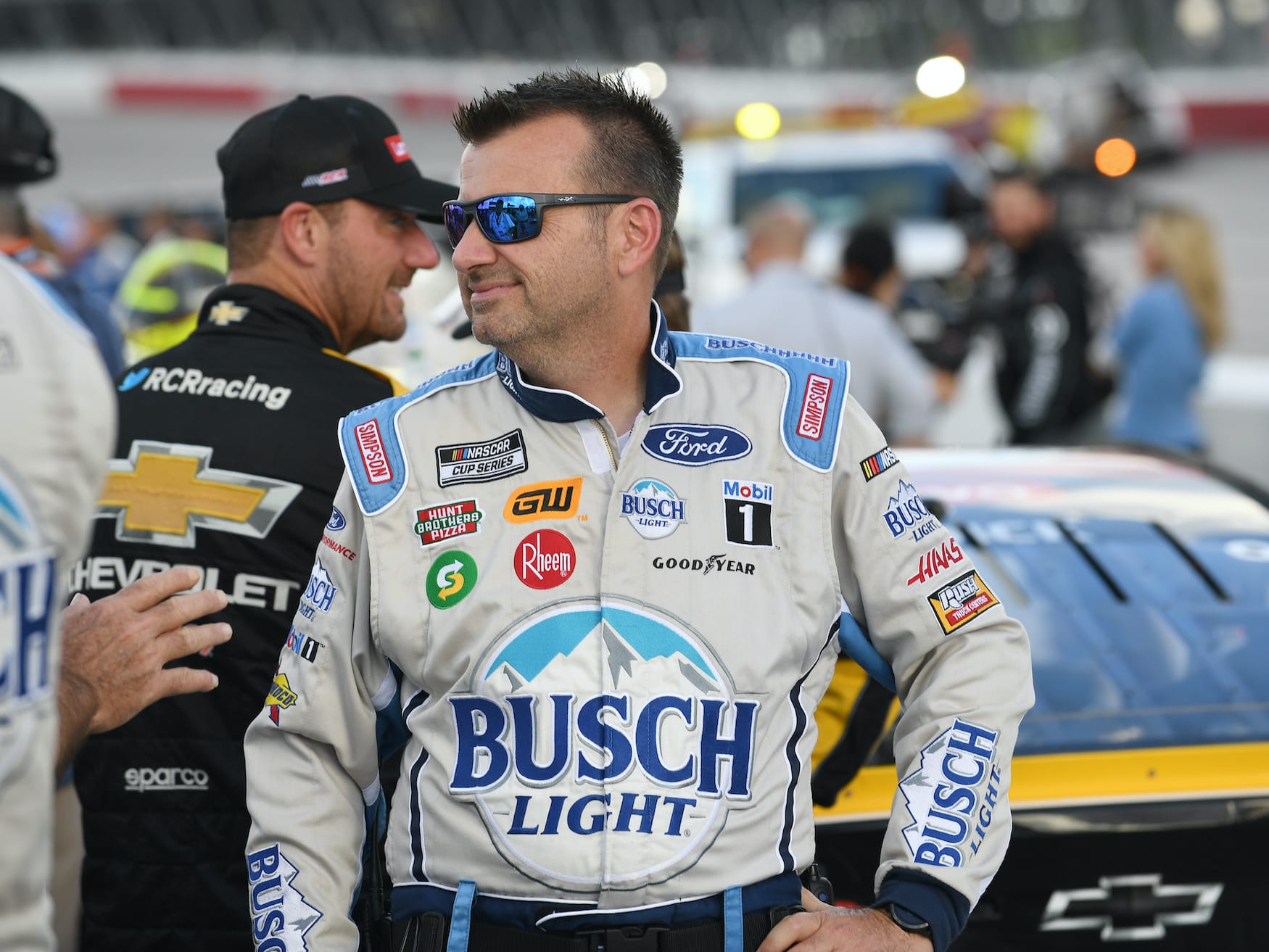 Rodney Childers looks on at race.