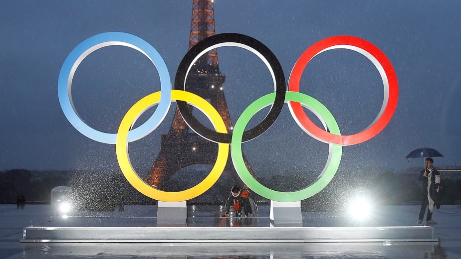 Olympic rings in front of Eiffel Tower