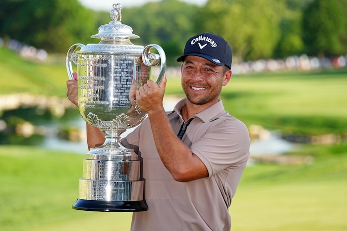 Xander Schauffele holds The Wanamaker Trophy after winning the PGA Championship.