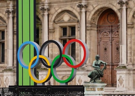 Paris, FRANCE; the Olympic rings are on display outside of the Hotel de Ville a