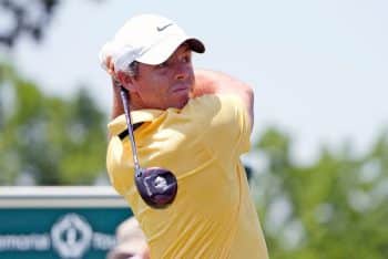 Rory McIllroy tees off.