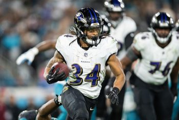 Baltimore Ravens running back Keaton Mitchell runs the ball.