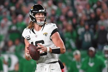 Jacksonville Jaguars quarterback Trevor Lawrence looks for a receiver.