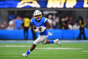 Chargers running back J.K. Dobbins runs the ball.