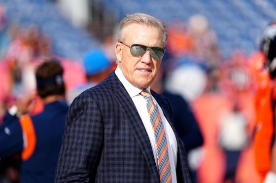 Denver Broncos president John Elway looks and stares.
