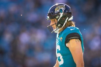 Jacksonville Jaguars quarterback Trevor Lawrence (16) walks back to the huddle against the Houston Texans.