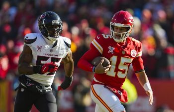 Kansas City Chiefs quarterback Patrick Mahomes runs the ball against Houston Texans .