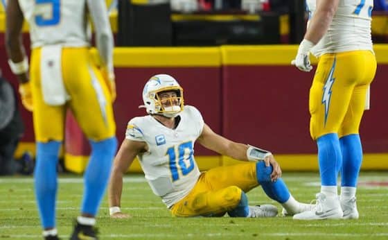 Los Angeles Chargers quarterback Justin Herbert sits down.