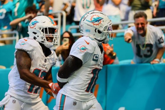 Miami Dolphins wide receiver Tyreek Hill celebrates with wide receiver Jaylen Waddle
