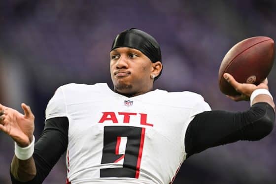 Michael Penix Jr. throws a ball.