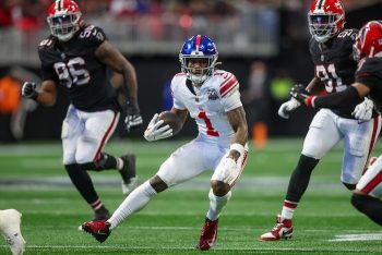 New York Giants wide receiver Malik Nabers (1) runs after a catch.