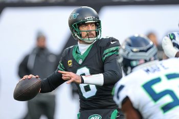 New York Jets quarterback Aaron Rodgers (8) throws the ball.