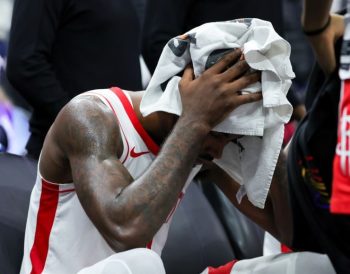 Houston Rockets Tari Eason Held Back from Running After Kings Fan in Stands