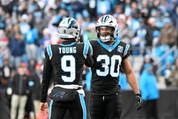 nfl panthers bryce young and chuba hubbard shake hands (1)