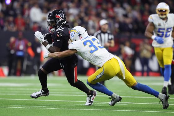 Houston Texans wide receiver Diontae Johnson runs with the ball.