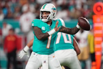 Miami Dolphins quarterback Tua Tagovailoa throws the ball.