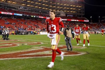 San Francisco 49ers quarterback Brock Purdy runs off the field.