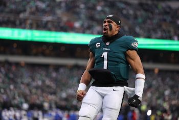 Philadelphia Eagles quarterback Jalen Hurts runs and screams.