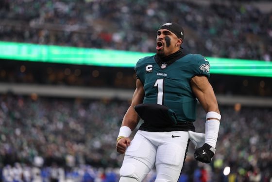 Philadelphia Eagles quarterback Jalen Hurts runs and screams.