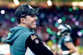 Kellen Moore looks up and stares.