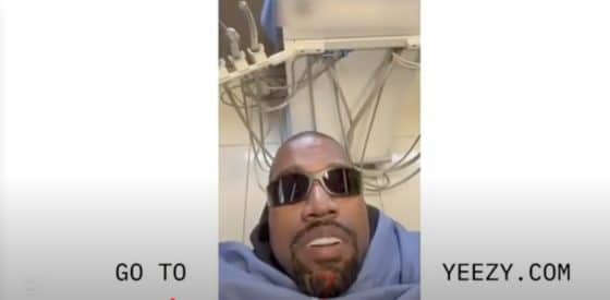 Kanye West sits in a dentist chair.