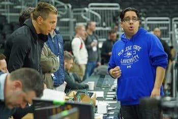 Amir Khan, McNeese State men's basketball manager stands and looks.