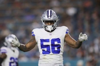 Dallas Cowboys defensive end Dante Fowler Jr. stands on the field.