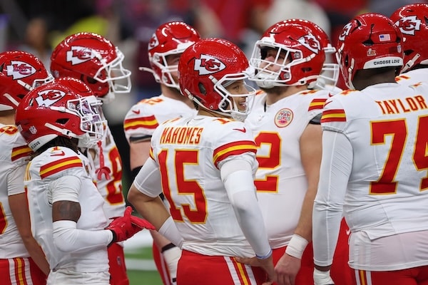 Kansas City Chiefs team huddles up.