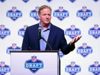 Roger Goodell stands at the podium.