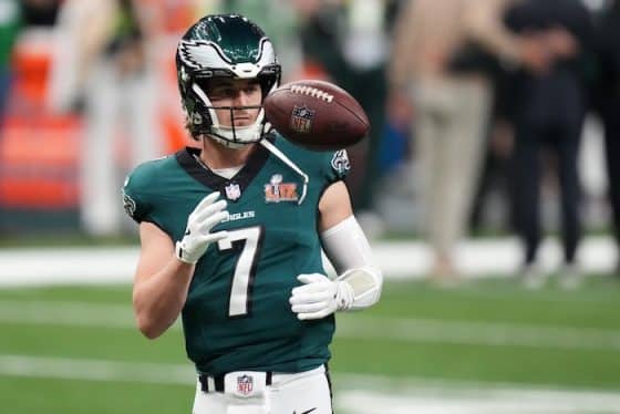 Philadelphia Eagles quarterback Kenny Pickett throws a ball in the air.