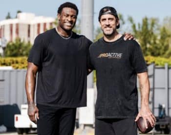 Aaron Rodgers and DK Metcalf pose for a photo.